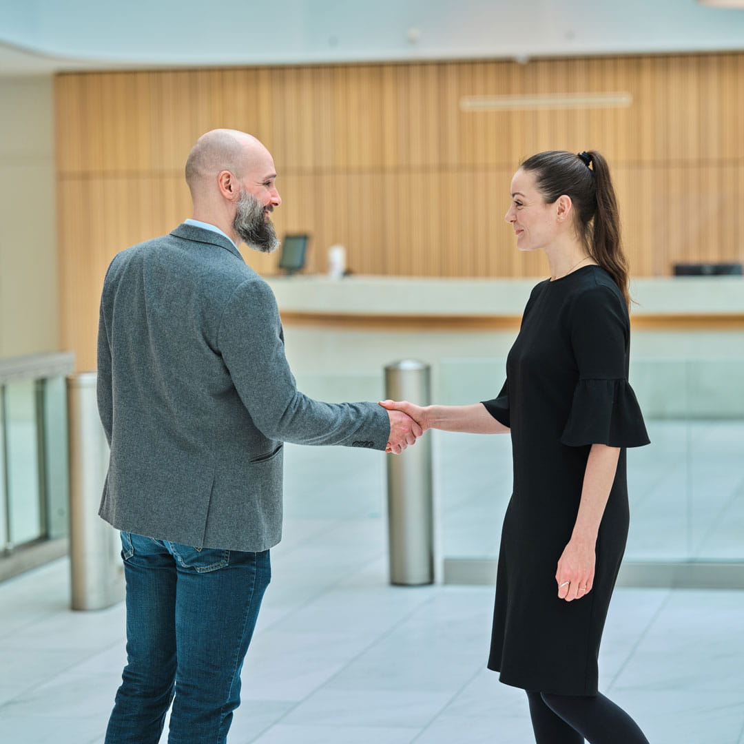 Two people shaking hands